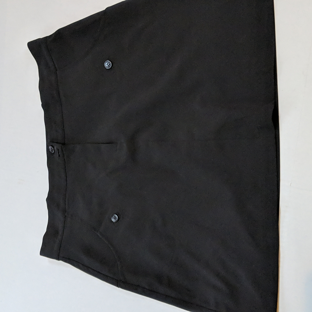 Nancy Lopez, black golf skort. 14